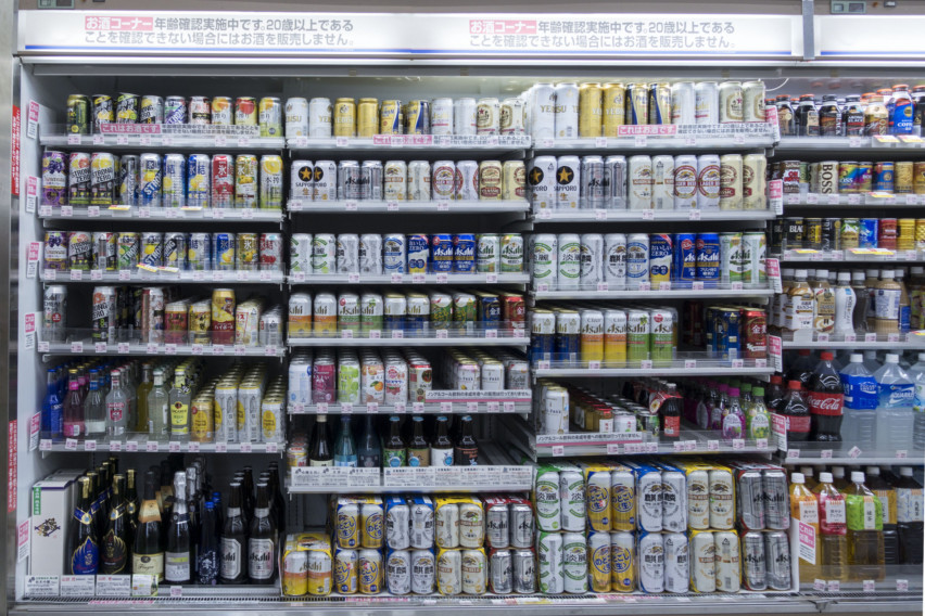 Rows of chilled alcoholic and non-alcoholic drinks in a Conbini