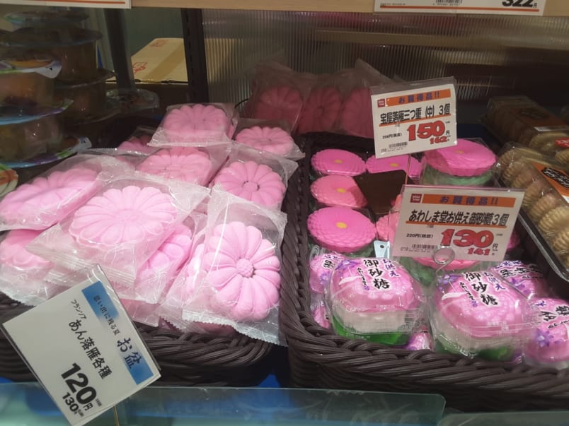 It is very common to put sugar flowers on the graves as offerings, as well as food, flowers and even sake