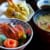 Plate of Japanese cuisine with sashimi, tempura, miso soup