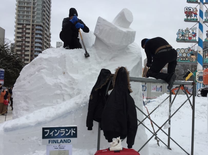 The Finnish team hard at work on their snow sculpture