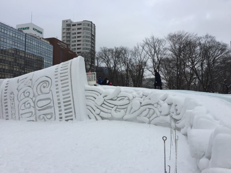 Parents and kids slide down the cup noodle ramen slide