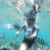 Woman snorkeling with fish at Ikei Island Okinawa